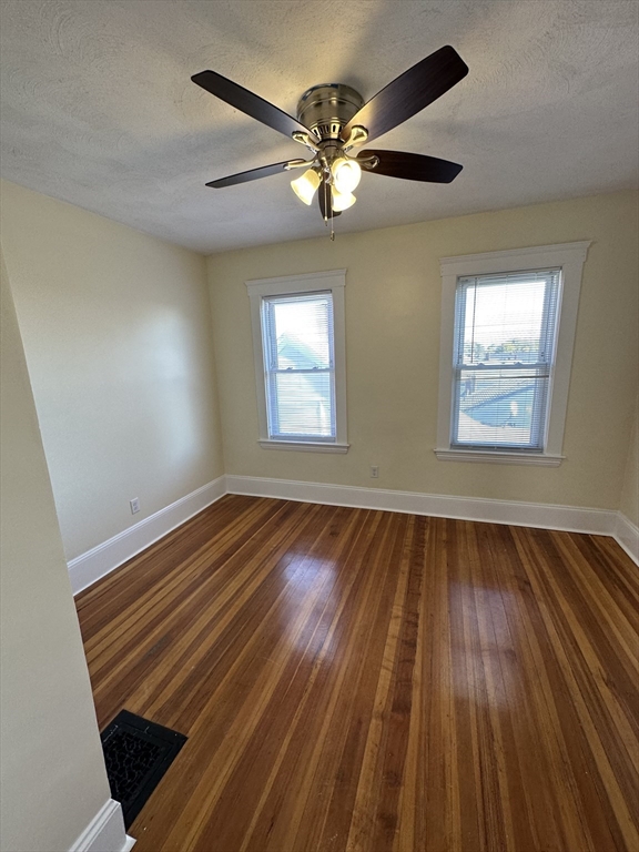 35 George Street, Unit 3 Everett, MA 02149 - Photo 16 of 34 a view of an empty room and wooden floor