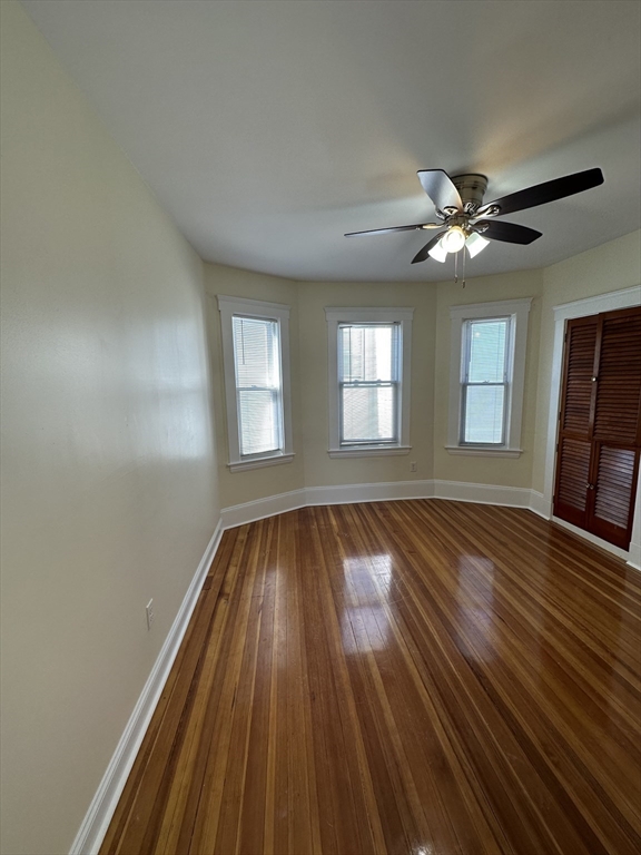 35 George Street, Unit 3 Everett, MA 02149 - Photo 20 of 34 wooden floor in an empty room with a window