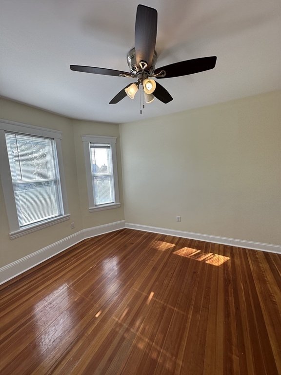 35 George Street, Unit 3 Everett, MA 02149 - Photo 28 of 34 a view of empty room with wooden floor and fan