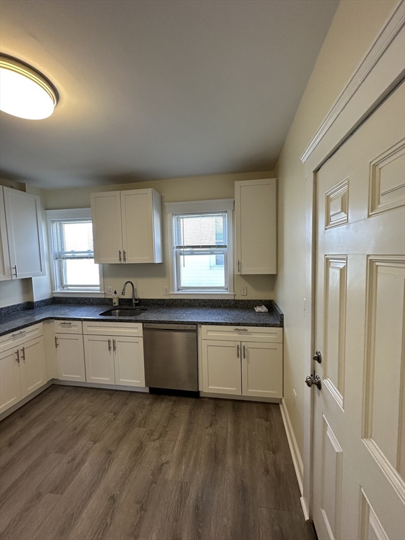 35 George Street, Unit 3 Everett, MA 02149 - Photo 3 of 34 a large kitchen with a stove a sink dishwasher and a refrigerator