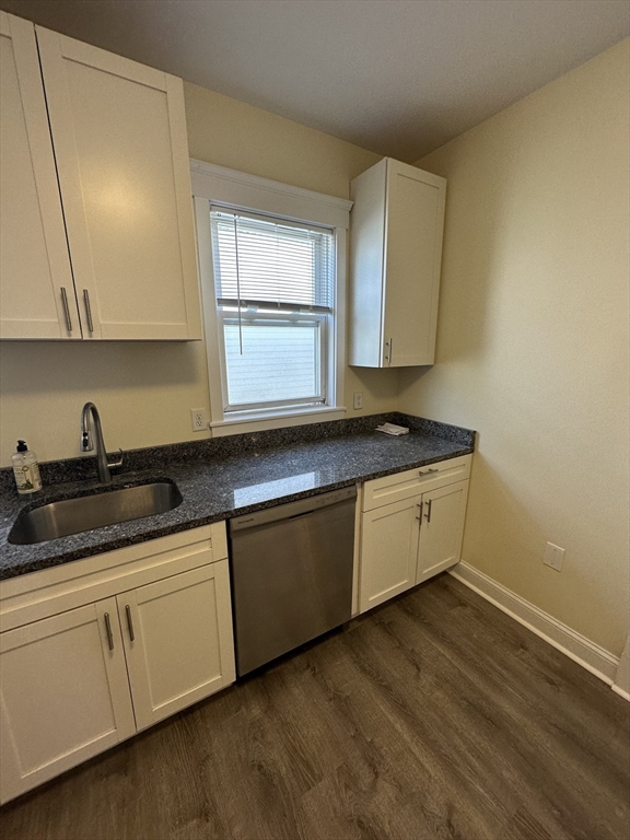 35 George Street, Unit 3 Everett, MA 02149 - Photo 8 of 34 a kitchen with granite countertop white cabinets and white appliances