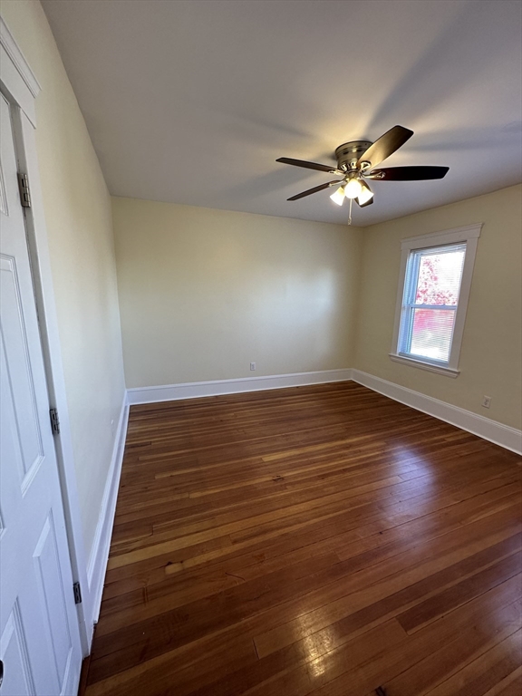 35 George Street, Unit 3 Everett, MA 02149 - Photo 9 of 34 wooden floor in an empty room with a window