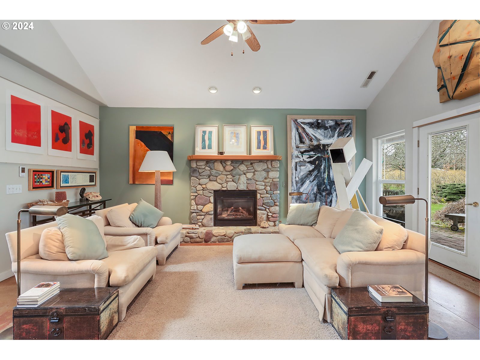 1190 Methodist Road Hood River, OR 97031 - Photo 8 of 41 a living room with furniture and a fireplace