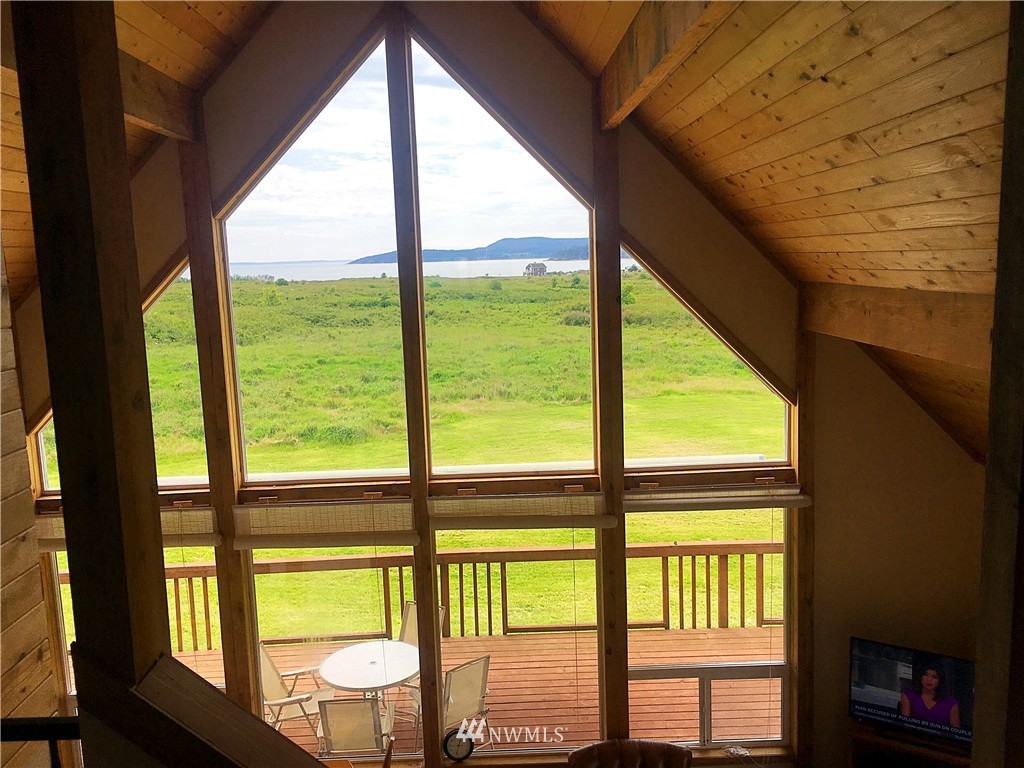 44 Beach Court Decatur Island, WA 98221 - Photo 11 of 25 a view of an outdoor with a large window