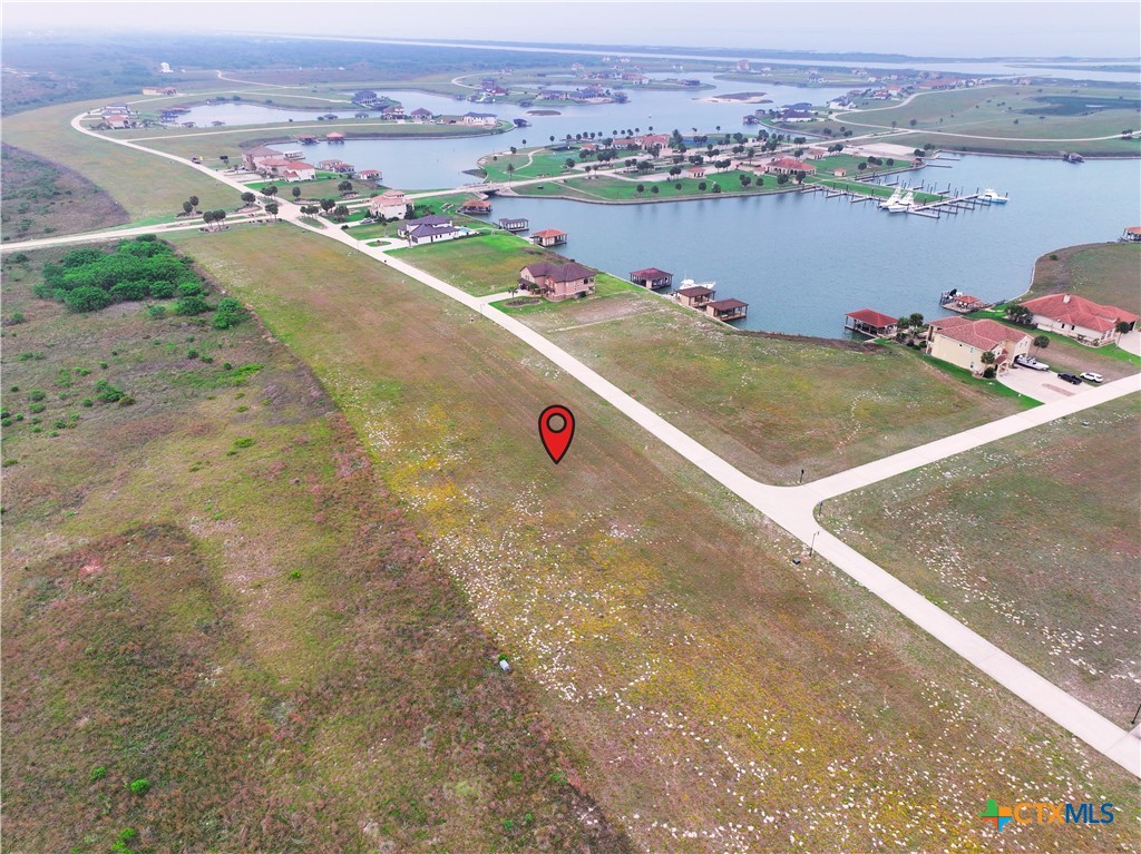 Lot 11 West Lago Loop Rd Port Port O'Connor, TX 77982 - Photo 4 of 7 an aerial view of a city