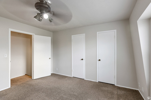 88 West 50 South, Unit J10 Centerville, UT 84014 - Photo 12 of 19 Room featuring light gray painted walls and brown carpet flooring