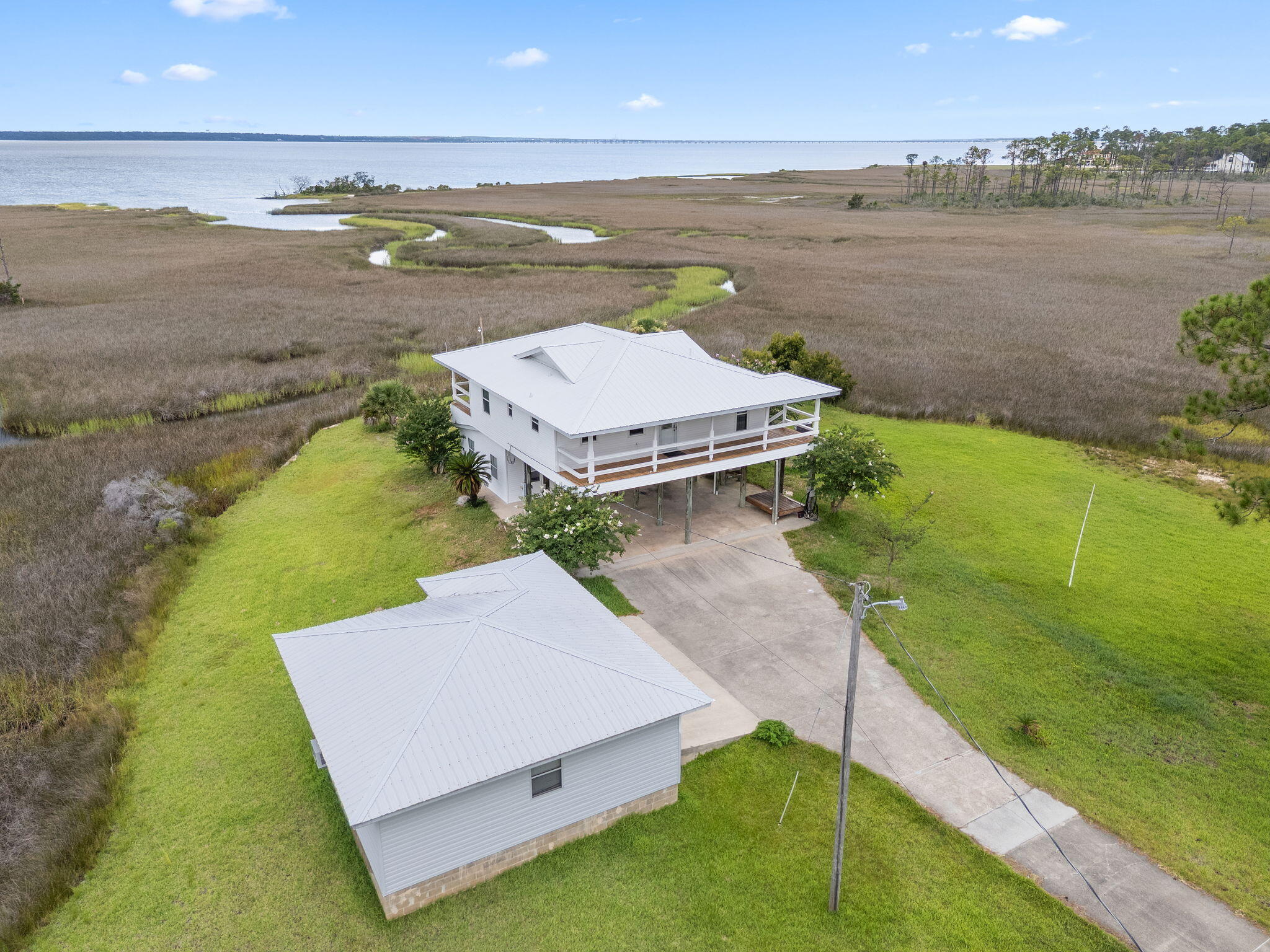 an aerial view of a house with a garden