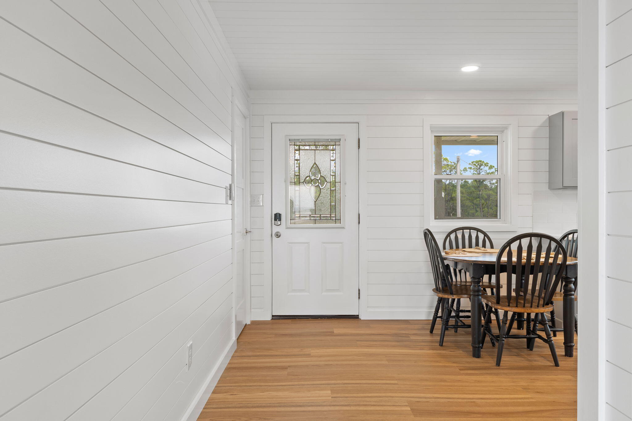 1357 Pearson Road Milton, FL 32583 - Photo 13 of 52 a view of a room with furniture and wooden floor