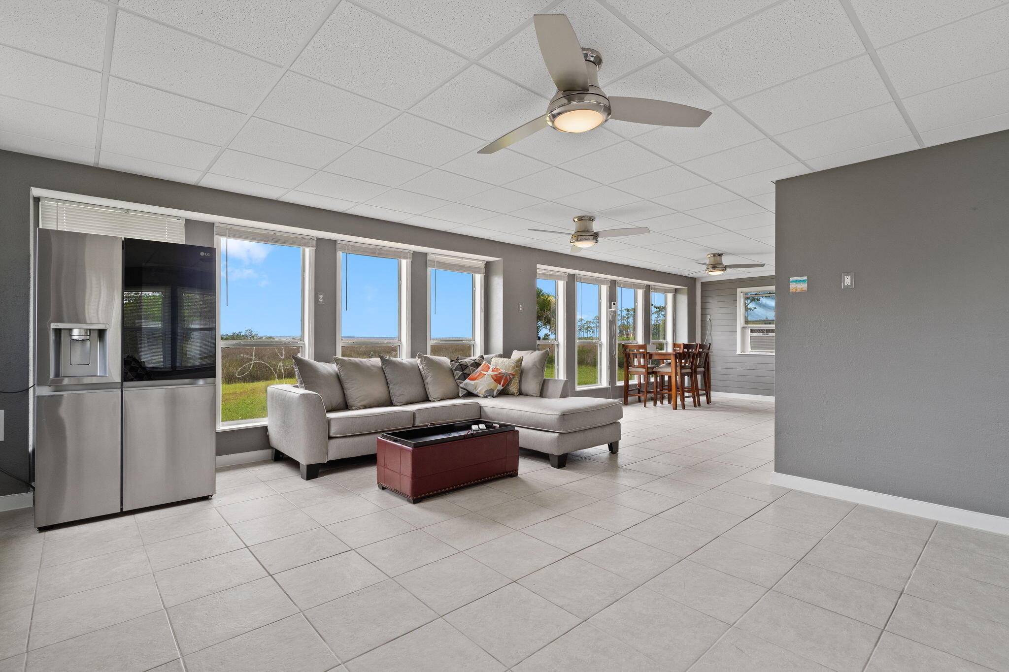 1357 Pearson Road Milton, FL 32583 - Photo 28 of 52 a living room with fireplace furniture and a large window
