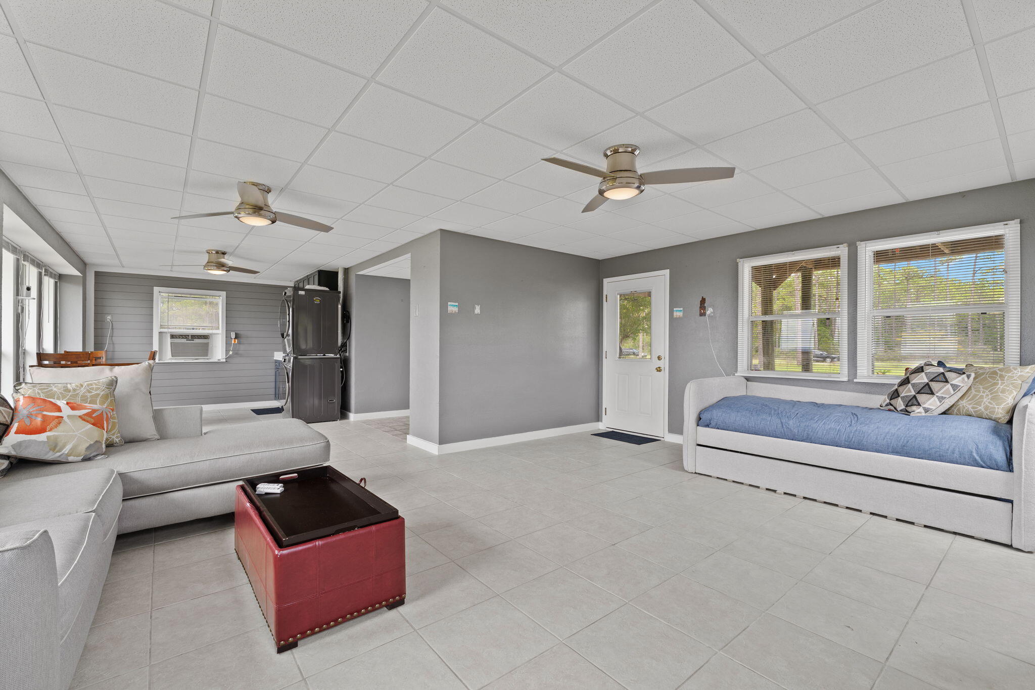 1357 Pearson Road Milton, FL 32583 - Photo 30 of 52 a living room with furniture ceiling fan and a rug