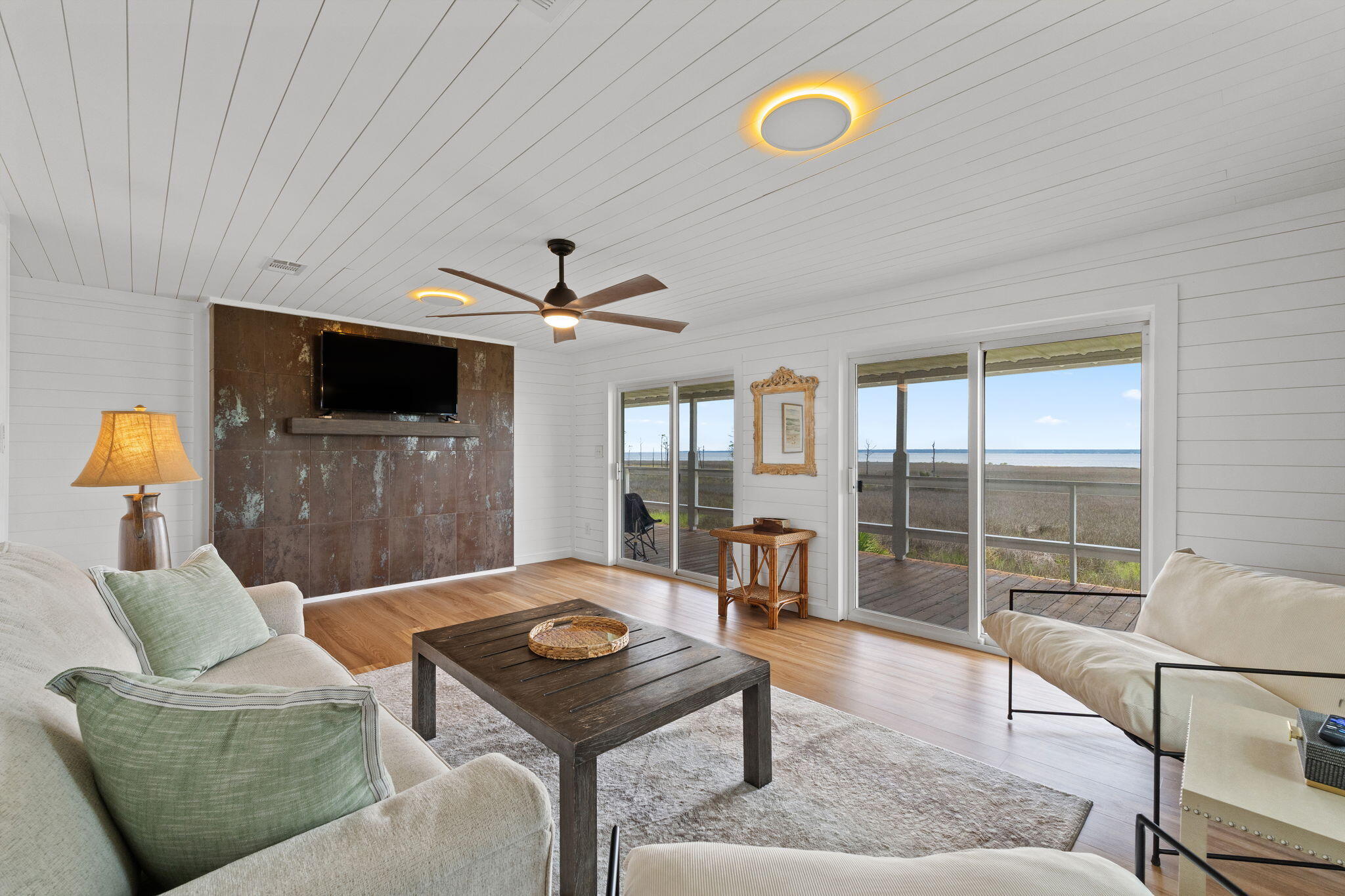 1357 Pearson Road Milton, FL 32583 - Photo 4 of 52 a living room with furniture and a flat screen tv