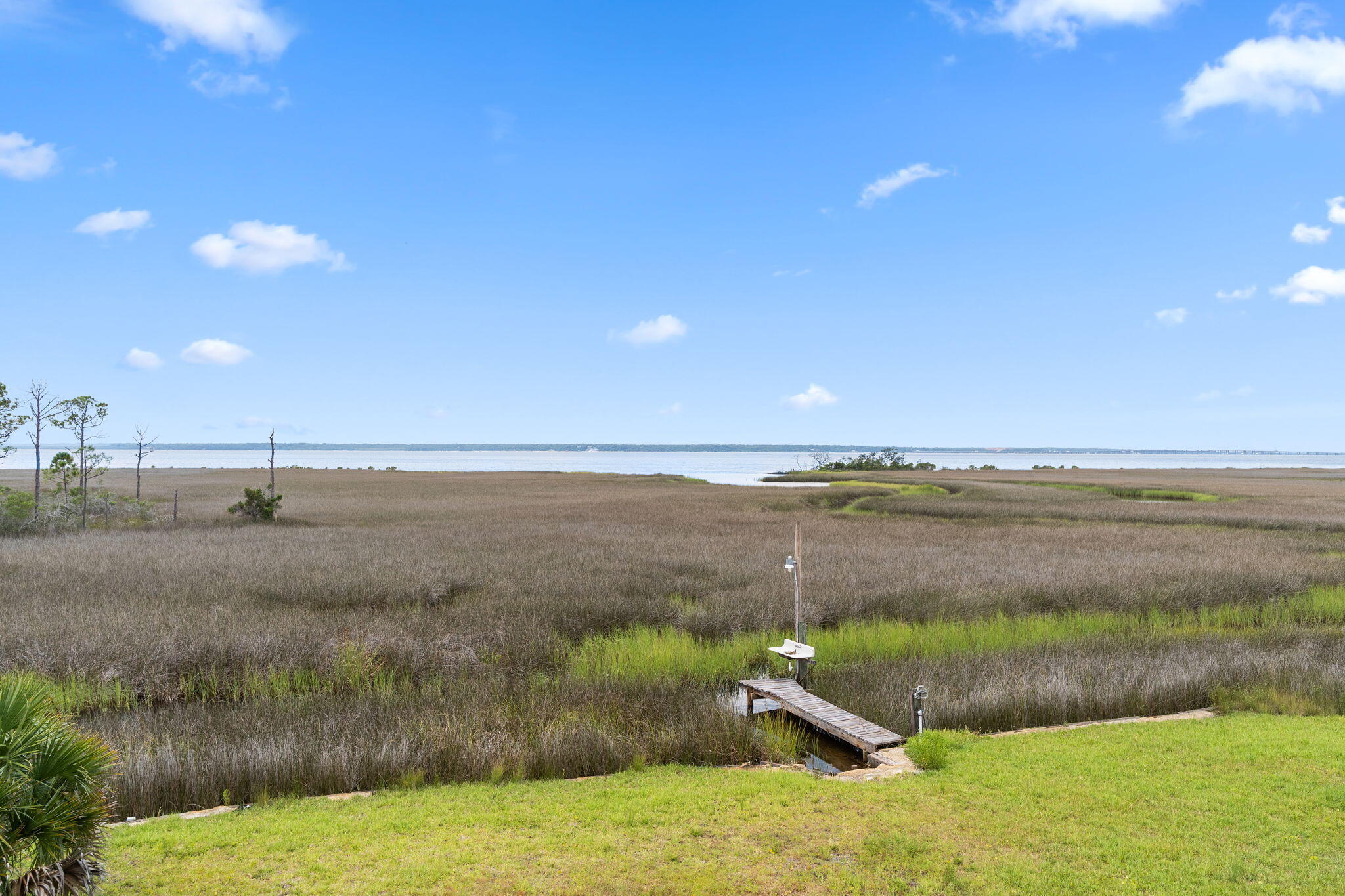 1357 Pearson Road Milton, FL 32583 - Photo 43 of 52 a view of a lake from a yard