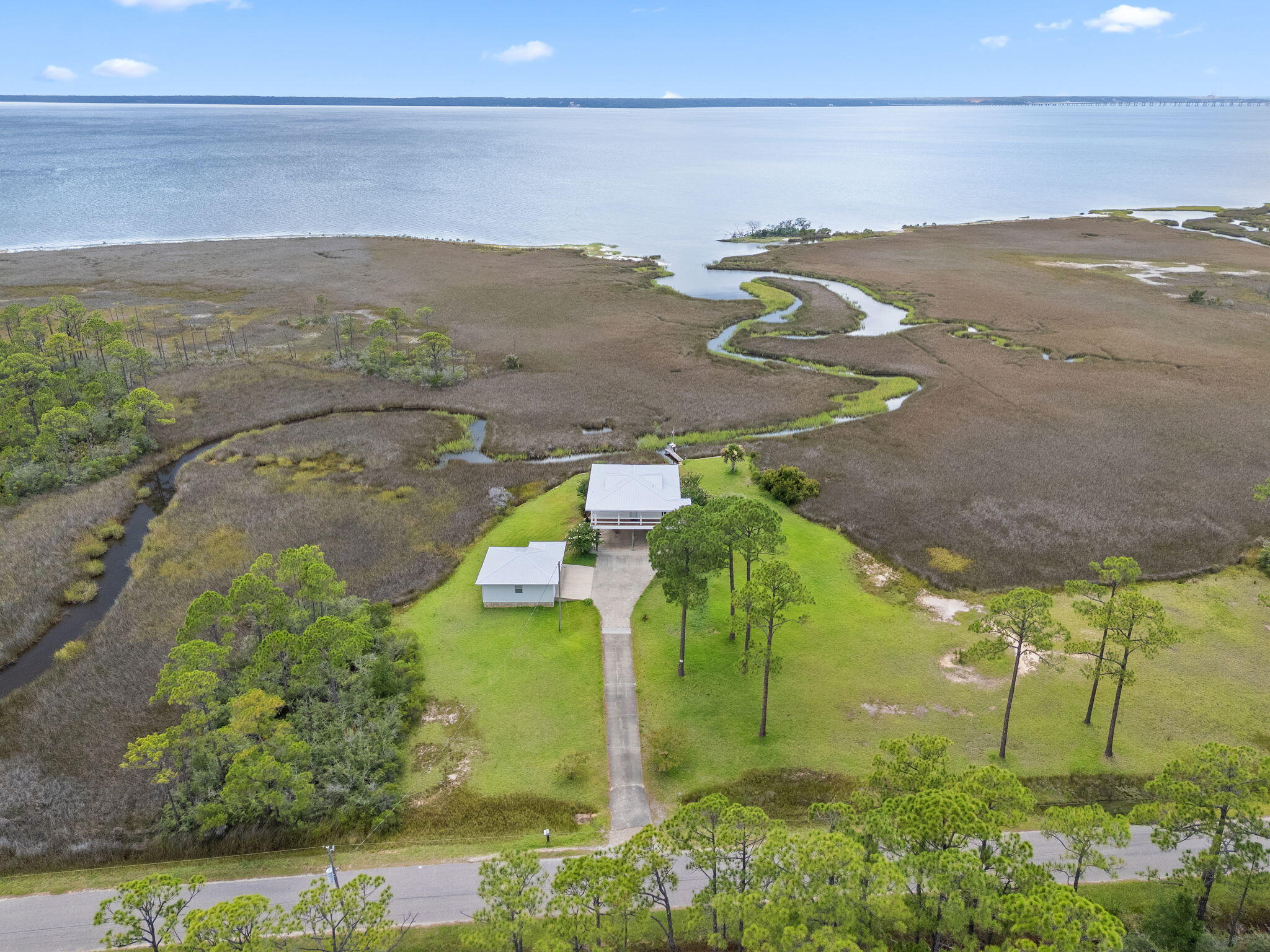 1357 Pearson Road Milton, FL 32583 - Photo 49 of 52 a view of a lake in middle of the town
