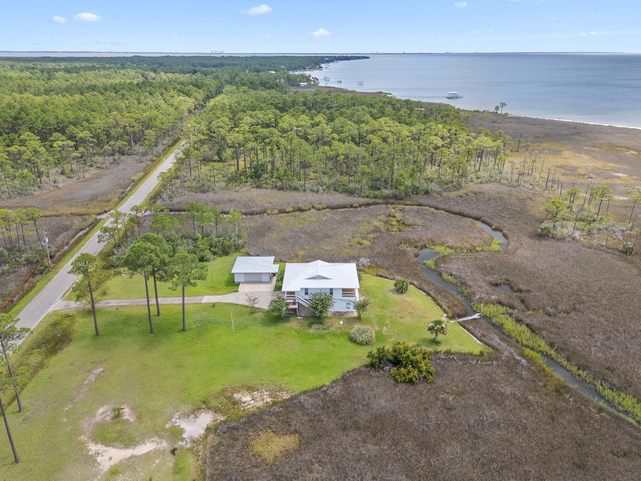 1357 Pearson Road Milton, FL 32583 - Photo 52 of 52 a view of an outdoor space and a lake view
