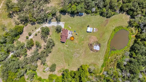 a view of a house with a big yard
