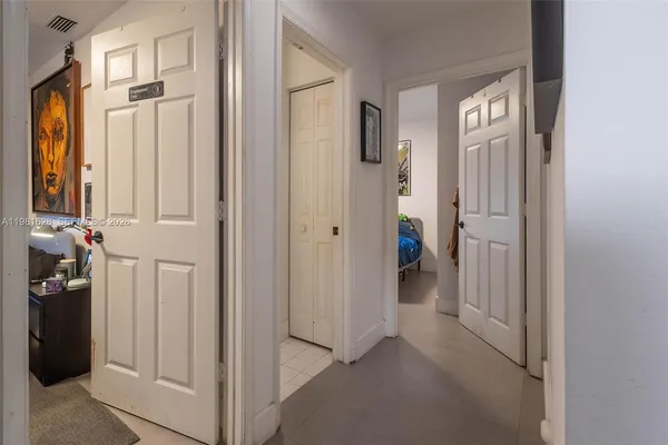 a view of a livingroom with a hallway
