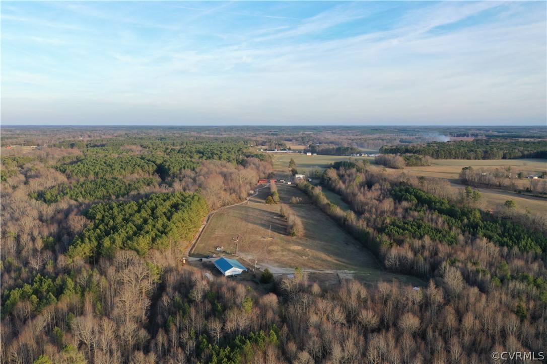 3071 Afton Grove Road Kenbridge, VA 23944 - Photo 24 of 30 an aerial view of residential houses with outdoor space and trees