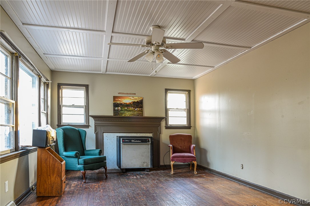 3071 Afton Grove Road Kenbridge, VA 23944 - Photo 6 of 30 a living room with furniture a fireplace and a flat screen tv