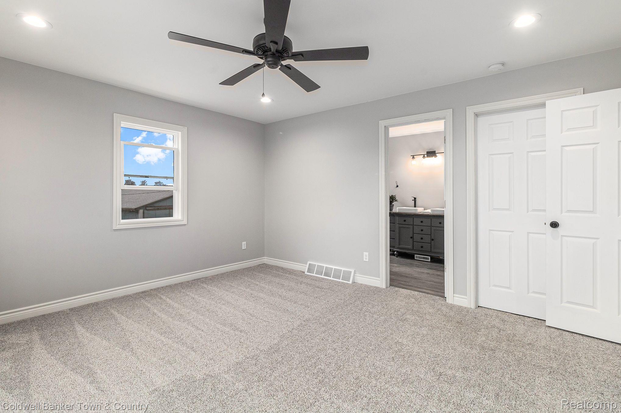 6666 West Sherwood Road Fowlerville, MI 48836 - Photo 22 of 45 1st floor Primary Bedroom