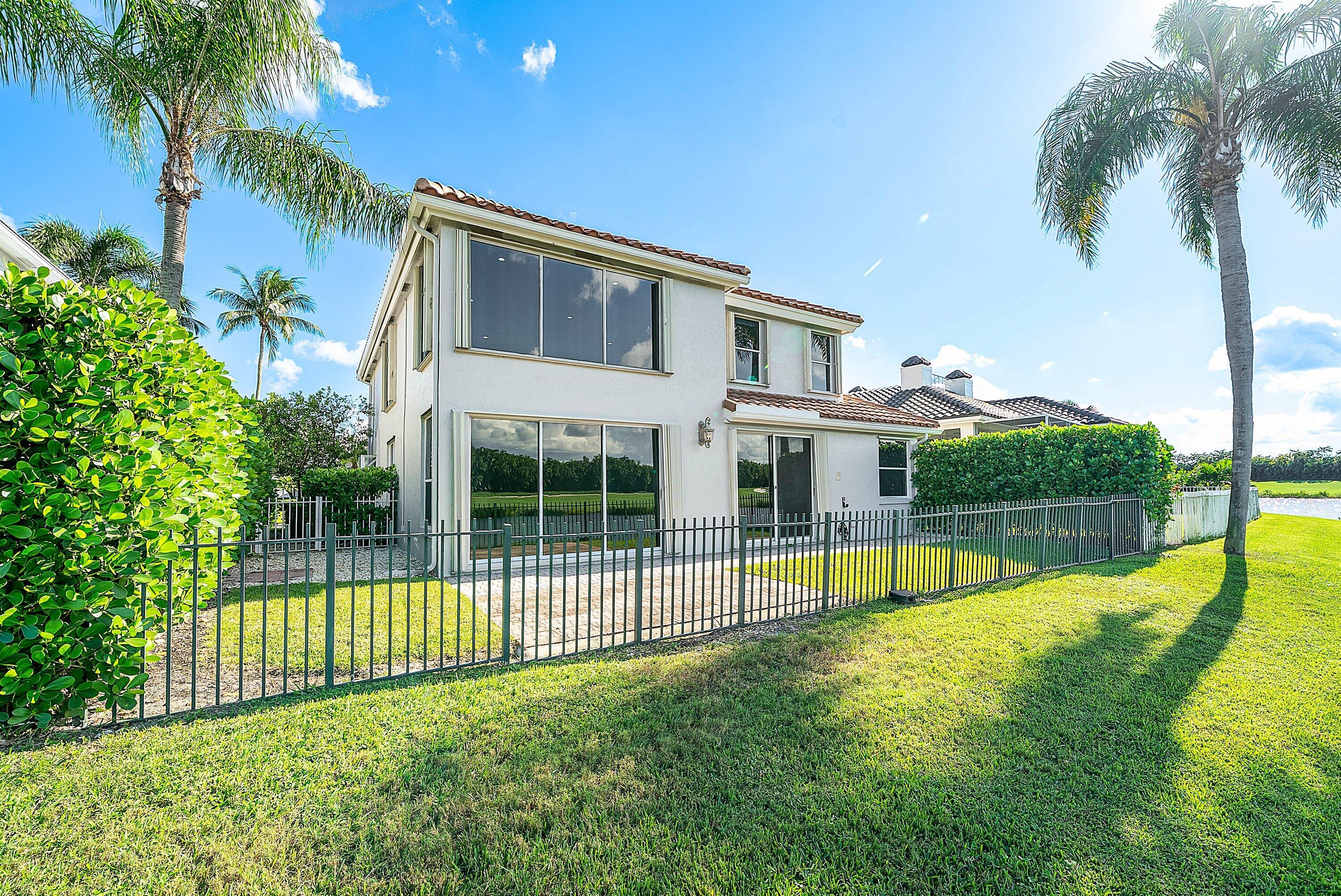 5855 Northwest 42nd Way Boca Raton, FL 33496 - Photo 43 of 77 a view of a house with a swimming pool