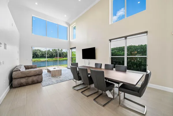 a living room with furniture and a rug