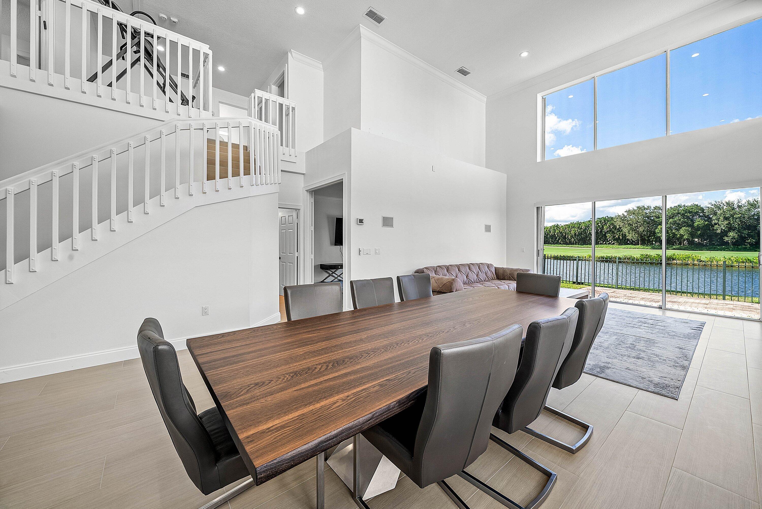5855 Northwest 42nd Way Boca Raton, FL 33496 - Photo 8 of 77 a view of a dining room with furniture