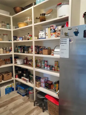 a room with a book shelf