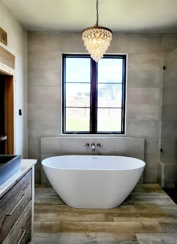 a view of a bathtub in a room