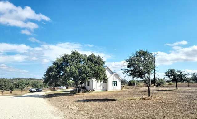 a view of road and trees