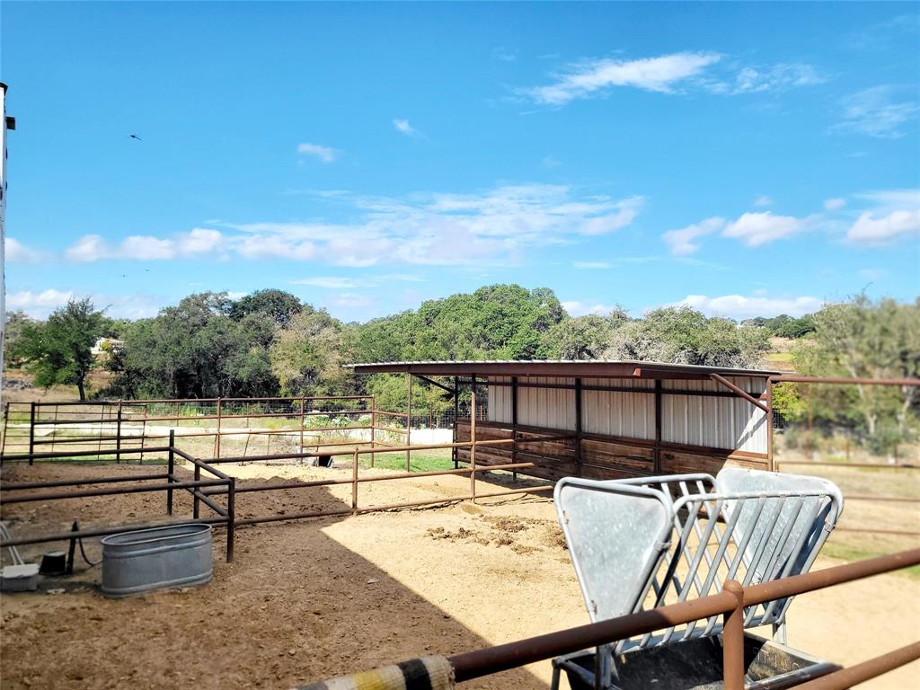 621 Stanton Road Johnson City, TX 78636 - Photo 38 of 40 a view of a balcony with lake view and mountain view