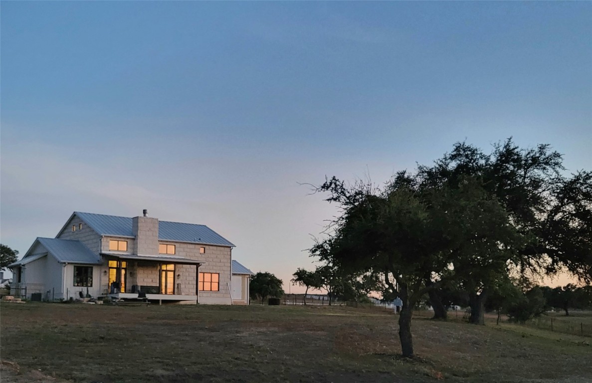 621 Stanton Road Johnson City, TX 78636 - Photo 40 of 40 a front view of a house with a yard