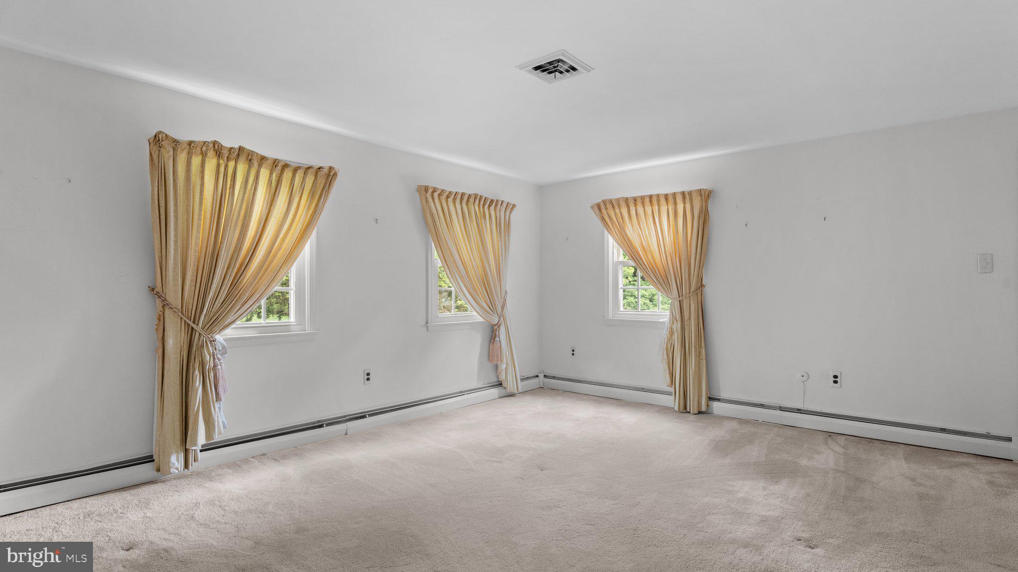 741 Spring Valley Road Doylestown, PA 18901 - Photo 25 of 41 an empty room with windows