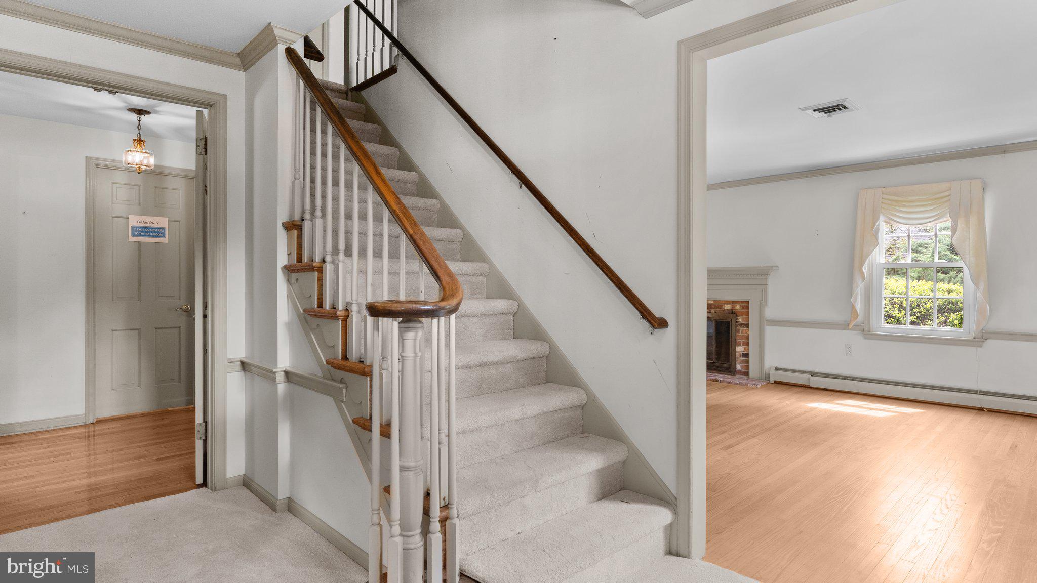 741 Spring Valley Road Doylestown, PA 18901 - Photo 30 of 41 a view of entryway with wooden floor and stairs
