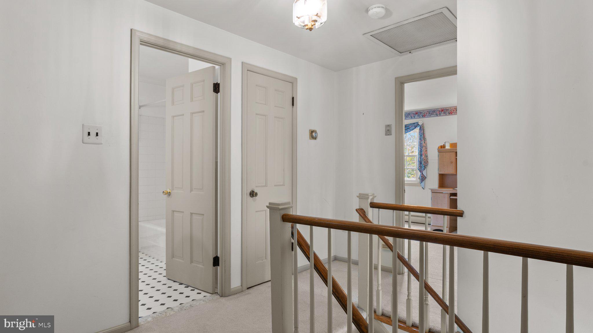 741 Spring Valley Road Doylestown, PA 18901 - Photo 31 of 41 a view of a hallway with wooden floor and entryway