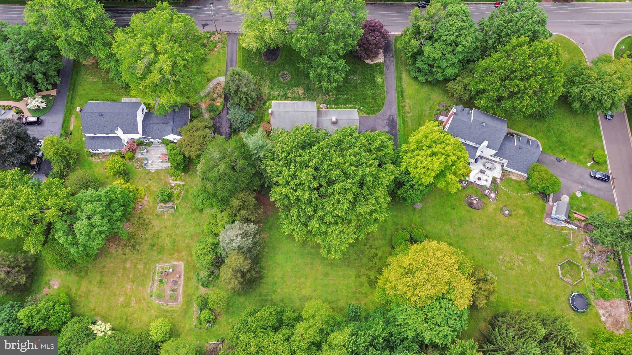 741 Spring Valley Road Doylestown, PA 18901 - Photo 8 of 41 an aerial view of residential house with outdoor space and trees all around