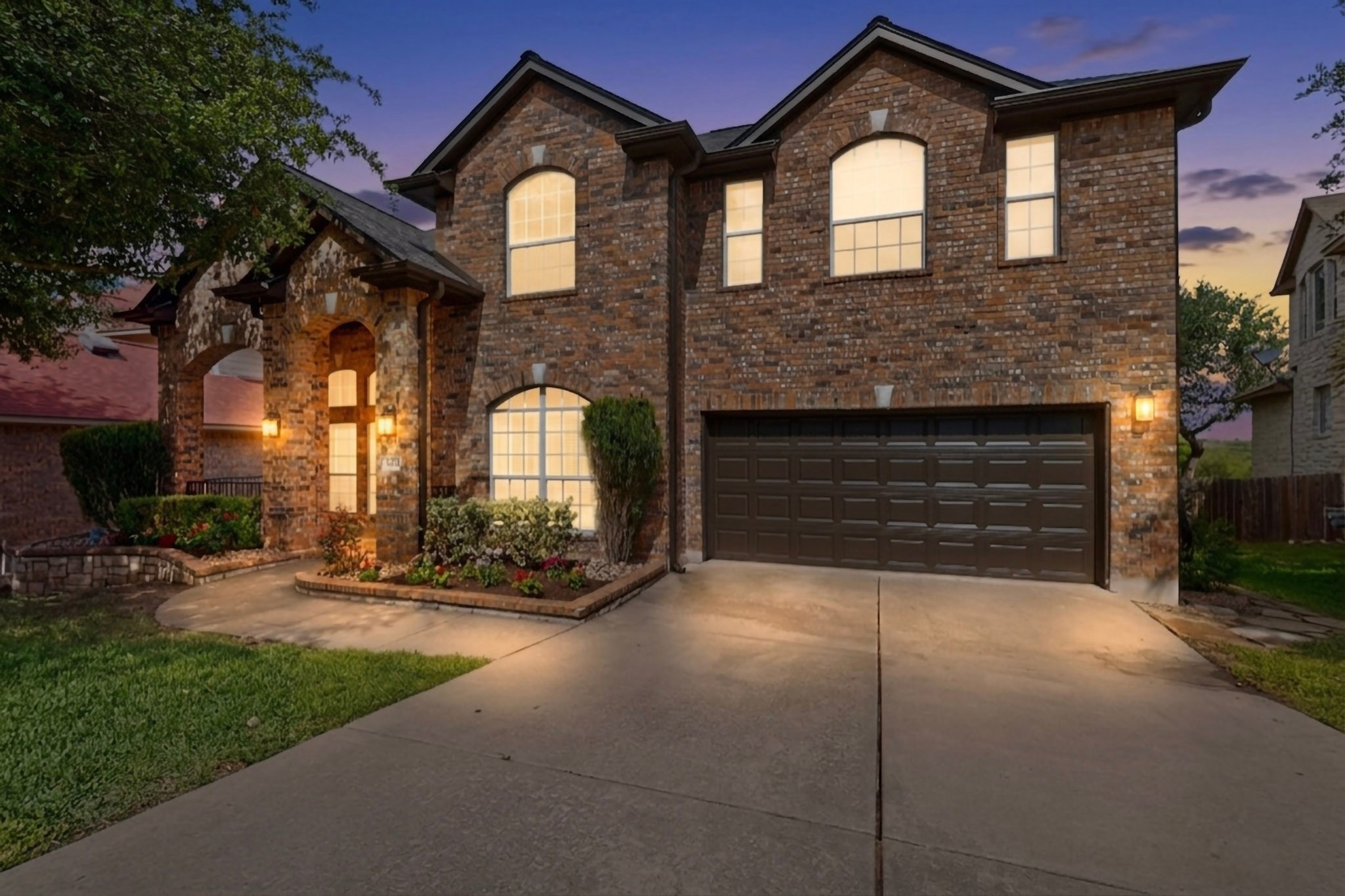 8617 Cobblestone Austin, TX 78735 - Photo 1 of 39 a front view of a house with a yard