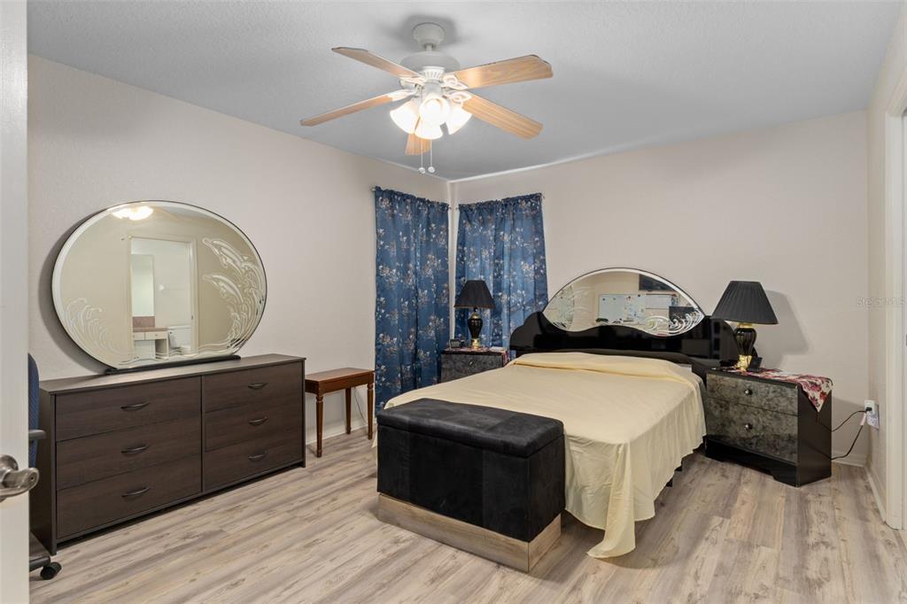 2104 Linwood Avenue Spring Hill, FL 34608 - Photo 20 of 44 a bedroom with a bed and a dresser