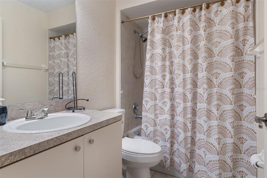 2104 Linwood Avenue Spring Hill, FL 34608 - Photo 30 of 44 a bathroom with a sink and a toilet