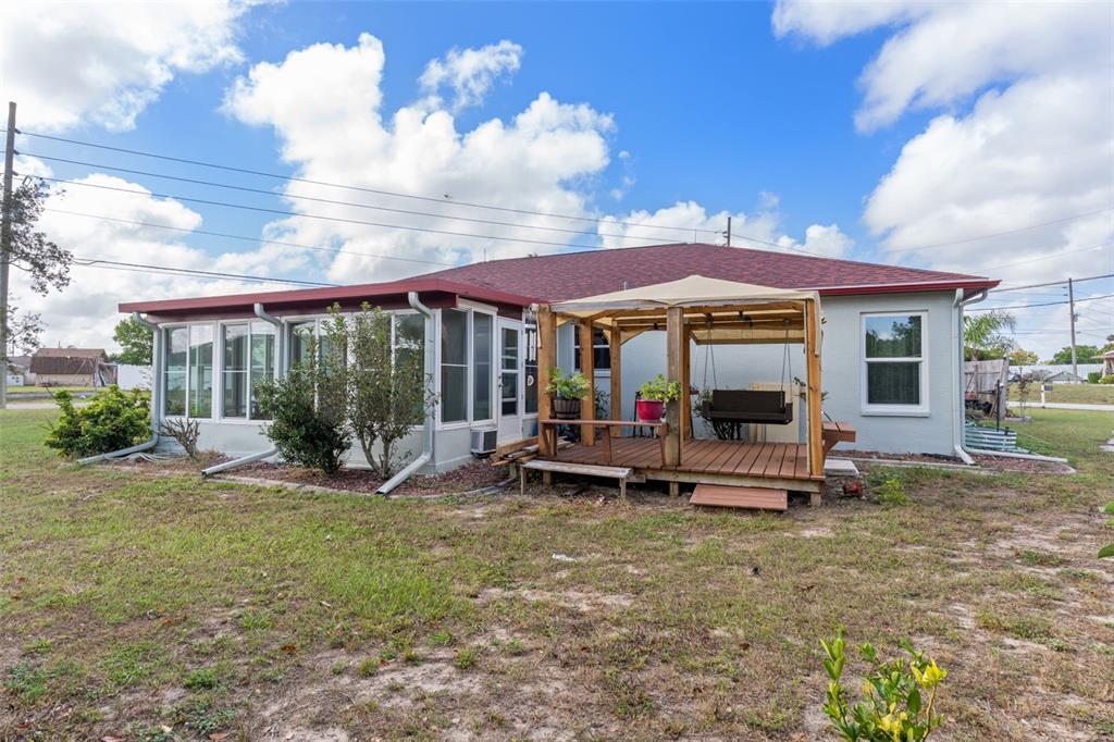 2104 Linwood Avenue Spring Hill, FL 34608 - Photo 39 of 44 a view of a house with backyard porch and sitting area