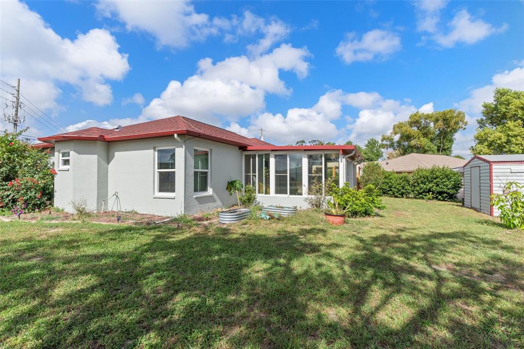 2104 Linwood Avenue Spring Hill, FL 34608 - Photo 40 of 44 a view of a house with a yard and sitting area