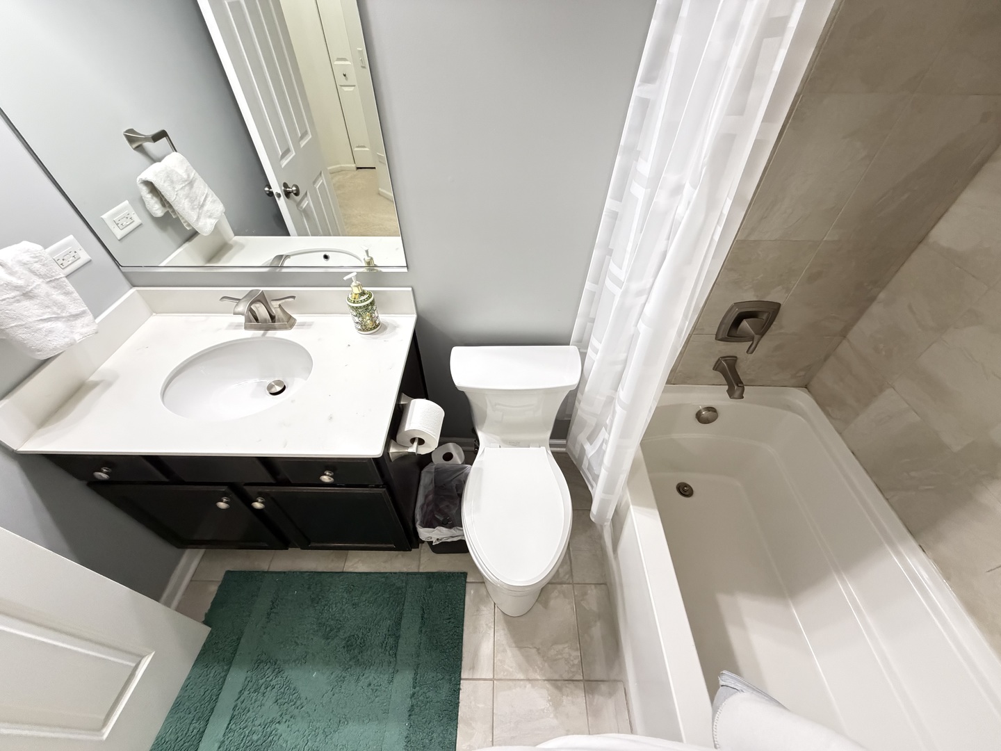 2911 Henley Lane, Unit 2911 Naperville, IL 60540 - Photo 16 of 23 a bathroom with a sink and mirror