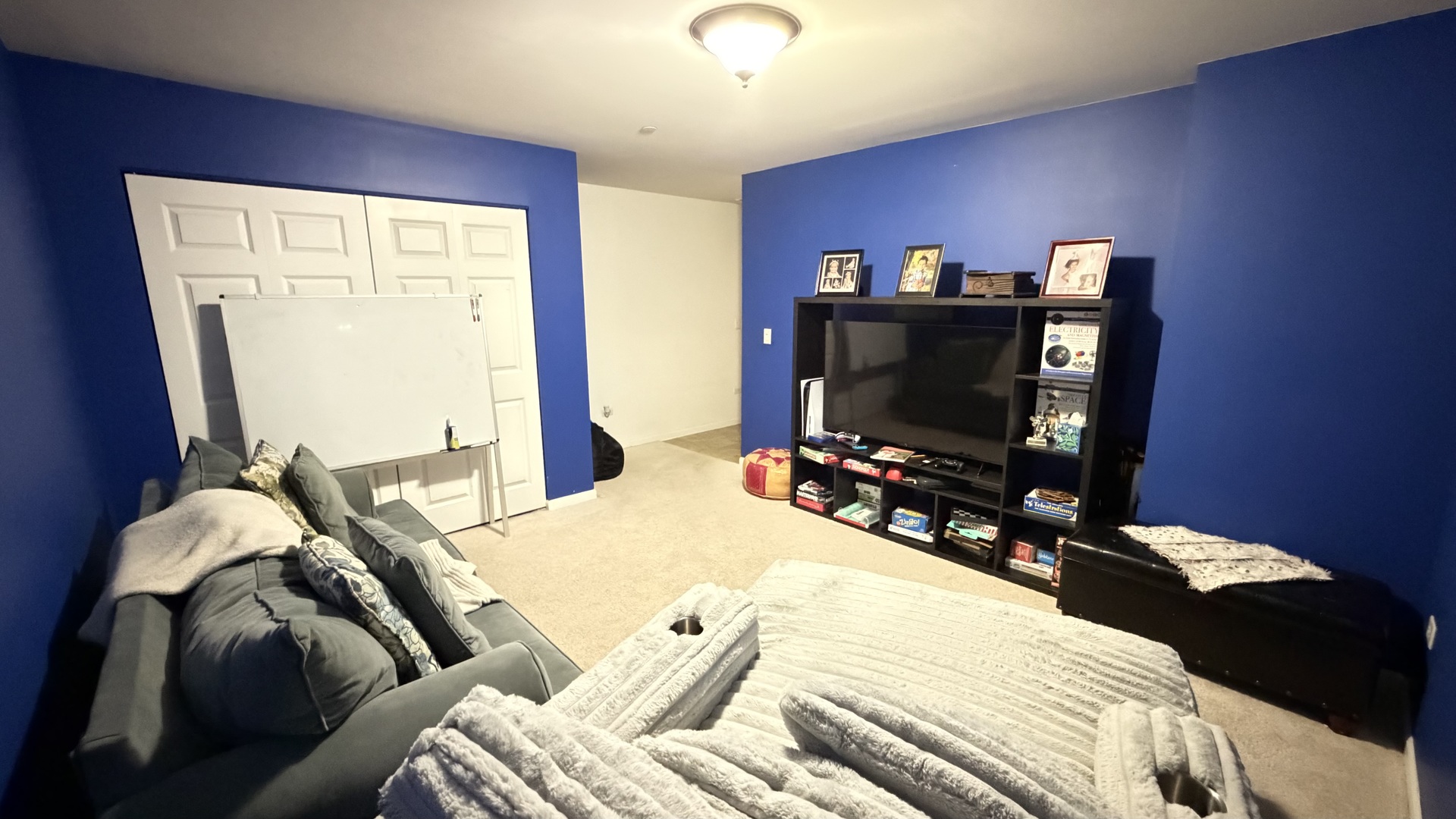 2911 Henley Lane, Unit 2911 Naperville, IL 60540 - Photo 19 of 23 a bedroom with a bed and a flat screen tv