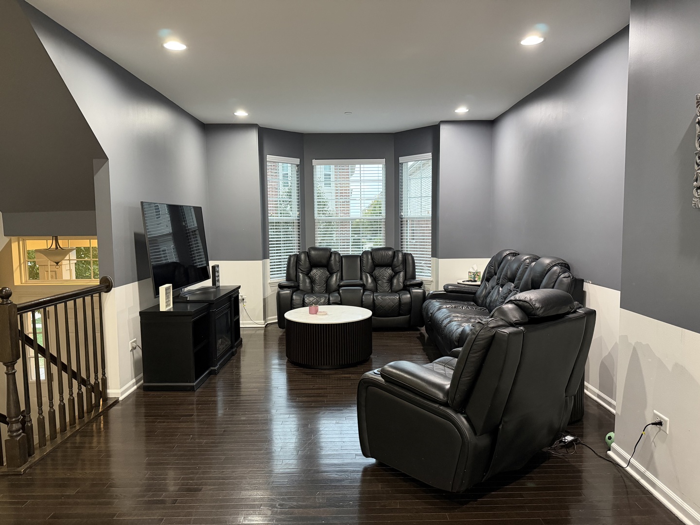 2911 Henley Lane, Unit 2911 Naperville, IL 60540 - Photo 4 of 23 a living room with furniture and a flat screen tv