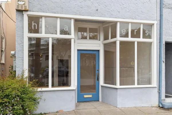 an entryway in a hall with a window