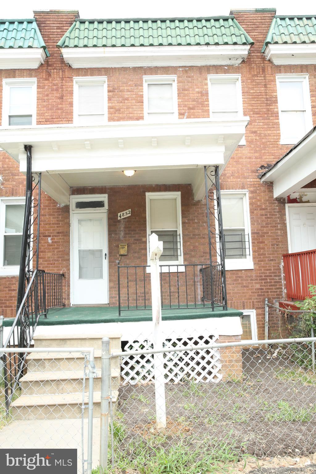 4852 Pimlico Road Baltimore, MD 21215 - Photo 1 of 40 a view of a house with a large windows