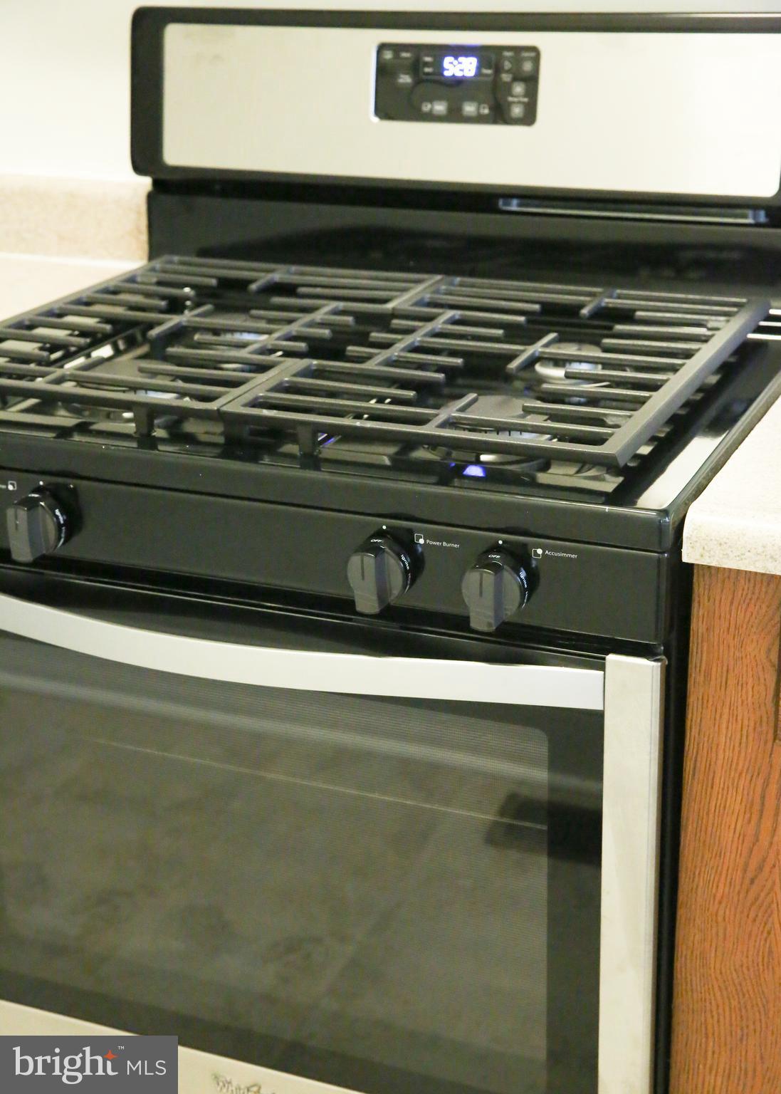 4852 Pimlico Road Baltimore, MD 21215 - Photo 11 of 40 a close view of stove top oven