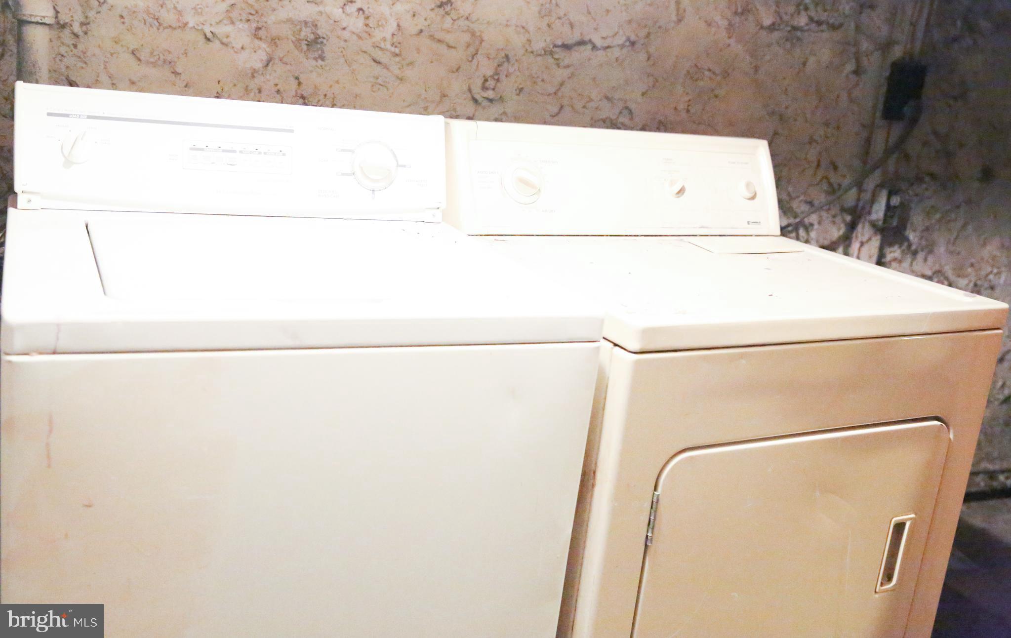 4852 Pimlico Road Baltimore, MD 21215 - Photo 30 of 40 a utility room with dryer and washer