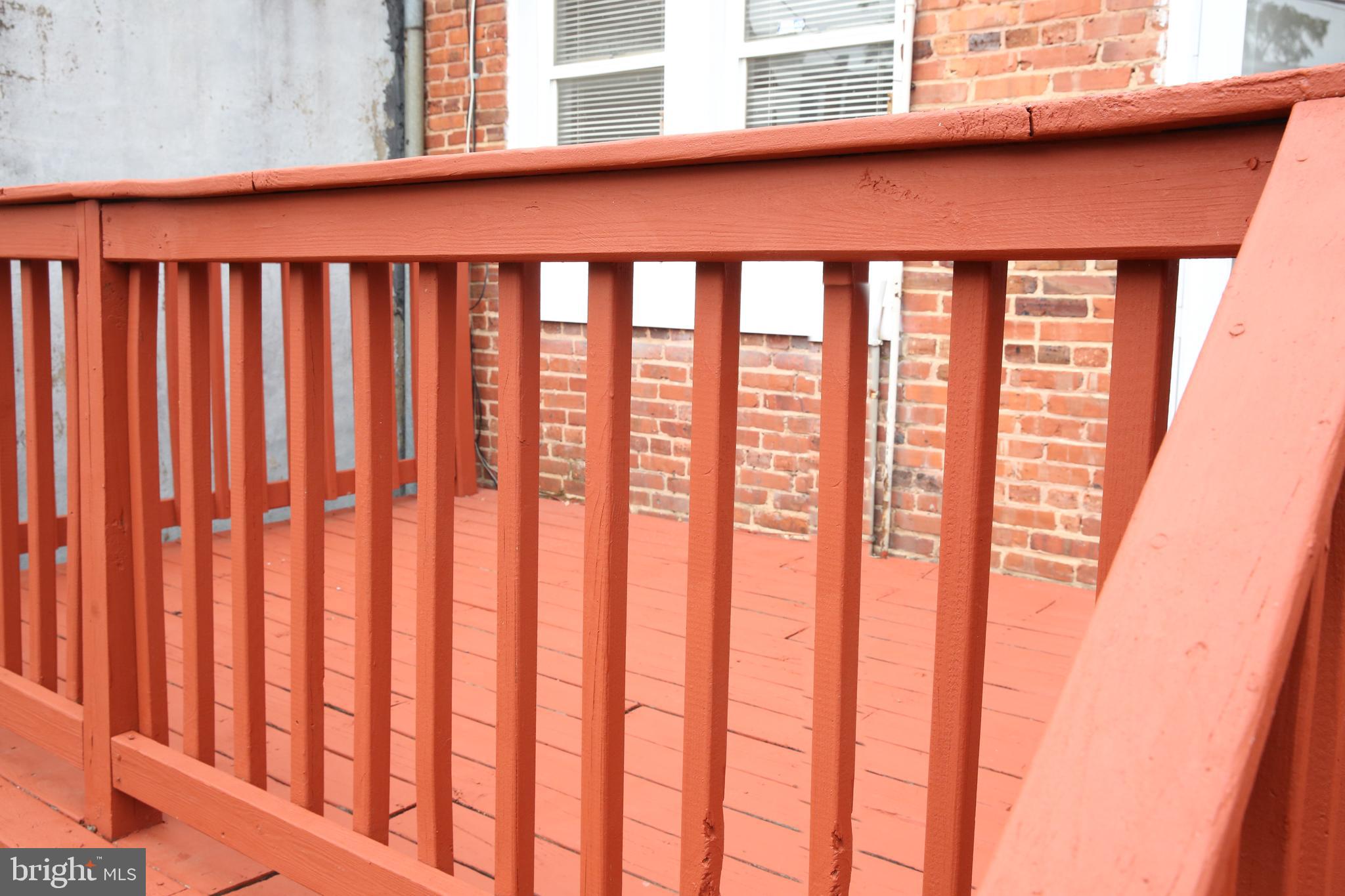 4852 Pimlico Road Baltimore, MD 21215 - Photo 35 of 40 a balcony with a large window