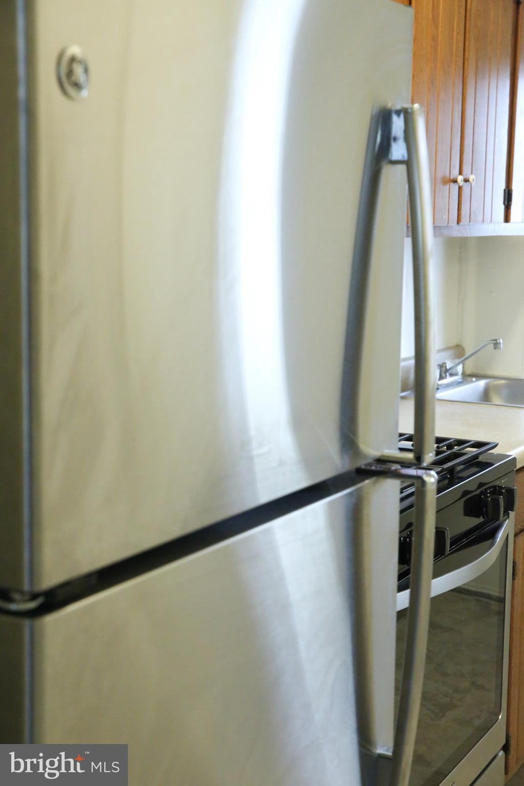 4852 Pimlico Road Baltimore, MD 21215 - Photo 10 of 40 a view of a kitchen with a sink