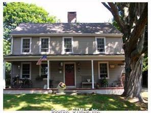 Undisclosed Address Clinton, CT 06413 - Photo 1 of 1 front view of a house with a yard